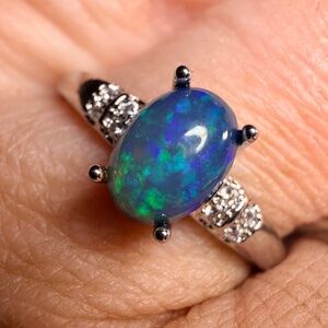 Super blue/green Ethiopian opal adjustable ring 7x5 stone